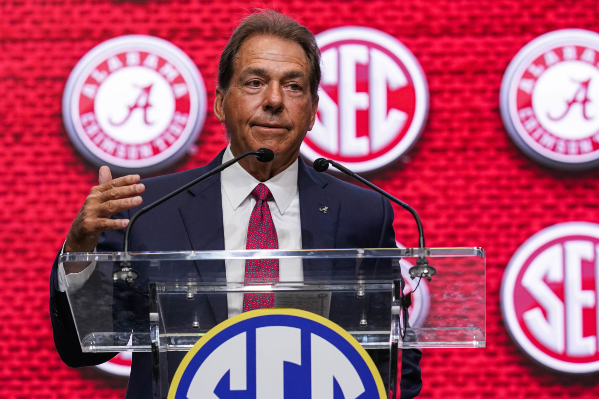 Alabama head coach Nick Saban speaks on the stage during the SEC Media Days at the College Football Hall of Fame.